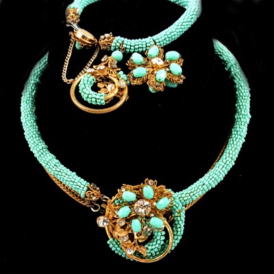 Lot 383 - Miriam Haskell - a signed faux turquoise, paste and gilt metal necklace and bracelet suite.