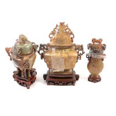 Lot 81 - Three modern Chinese jade lidded vases on stands.