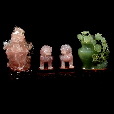 Lot 72 - A pair of modern carved rose quartz temple dogs, vase and cover, similar in jade.