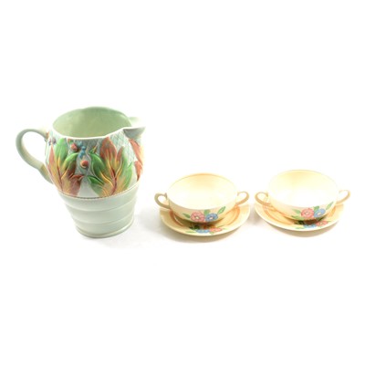 Lot 106 - Clarice Cliff Newport Pottery Celtic Leaf and Berry jug, and two twin-handled soup bowls.