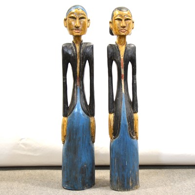 Lot 201 - Two carved and painted wood Indian figures