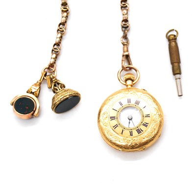 Lot 288 - A small yellow metal half hunter pocket watch and Albert watch chain.