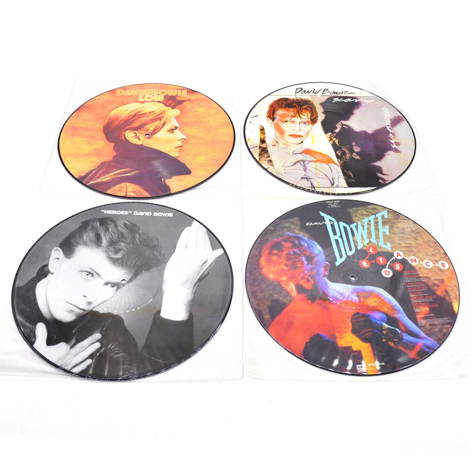 Lot 39 - Four David Bowie picture disc vinyl records.