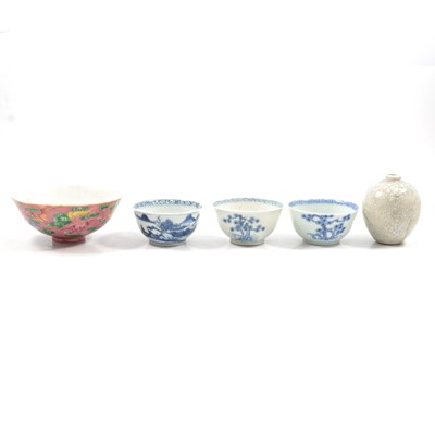 Lot 16 - Chinese porcelain bowl, three teabowls and a miniature vase
