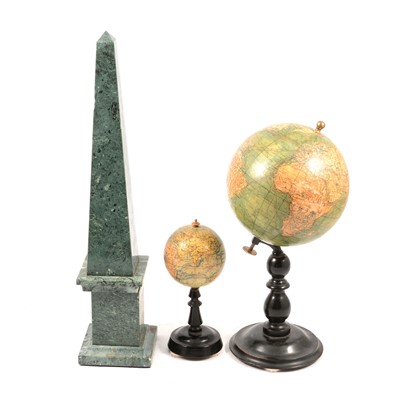 Lot 198 - Two reproduction table globes and a variegated hardstone obelisk