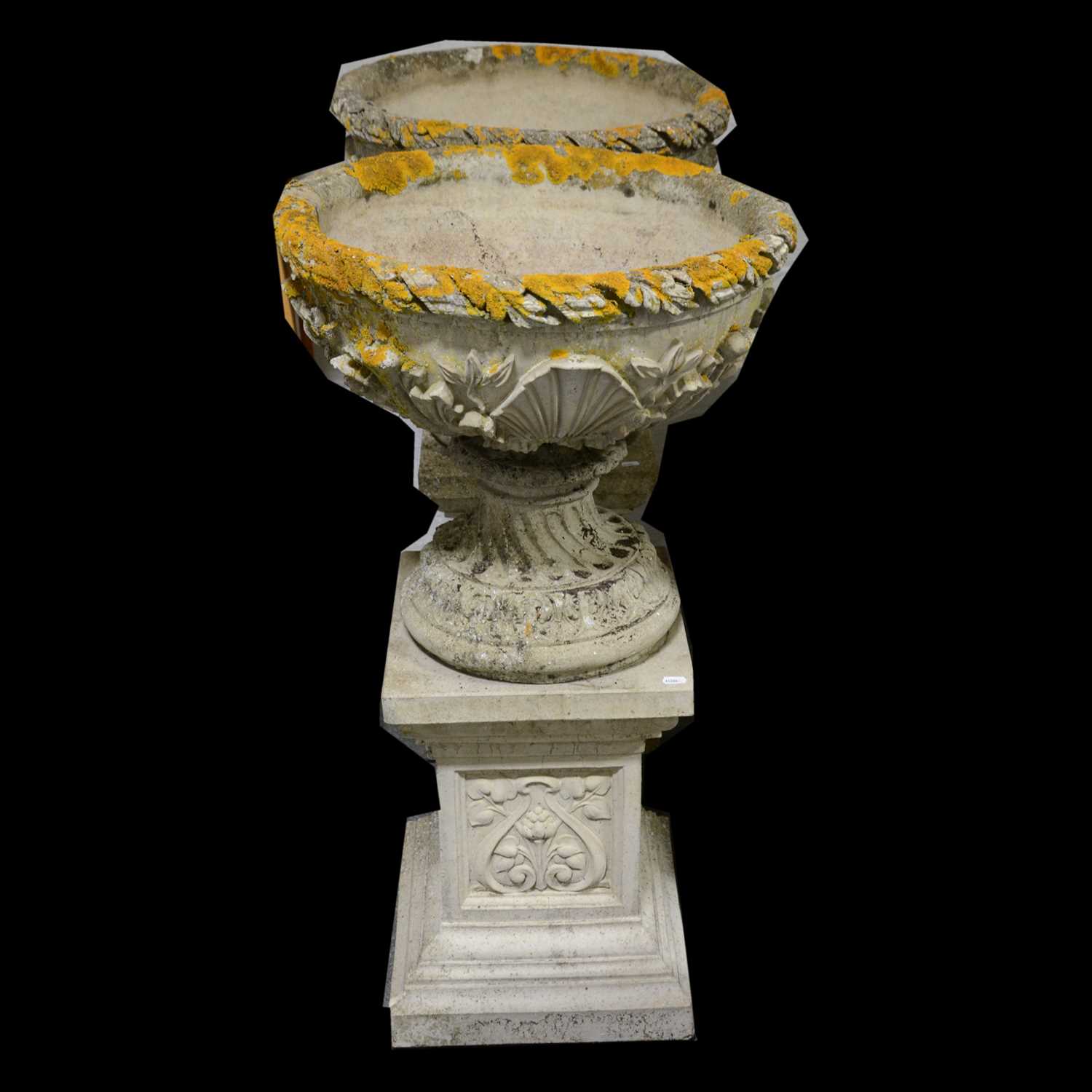 Lot 416 - Pair of pedestal garden urns, on rectangular plinths