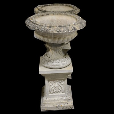 Lot 414 - Pair of pedestal garden urns, on rectangular plinths