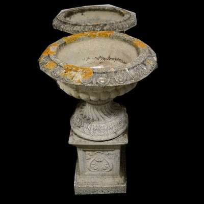 Lot 415 - Pair of pedestal garden urns, on rectangular plinths