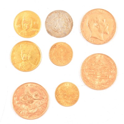 Lot 230 - CATALOGUE AMENDMENT ON WEIGHT. A Gold Full Sovereign, Edward VII, 1910, six other gold coins, and a silver coin.