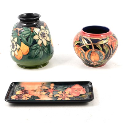 Lot 8 - Moorcroft Pottery - two vases and a tray, plus The Phoenix Years book