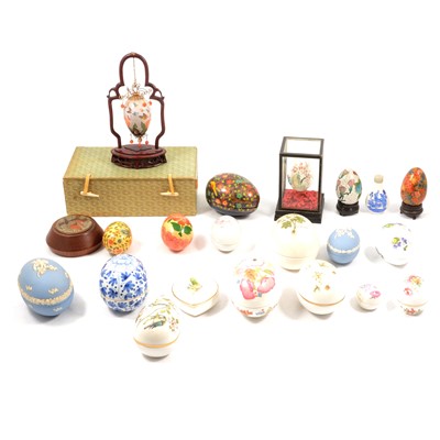 Lot 25 - Collection of glass, ceramic and wooden egg ornaments and trinket boxes.