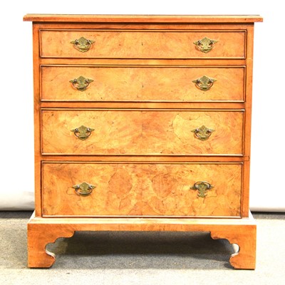 Lot 396 - Reproduction figured walnut chest of drawers, small size