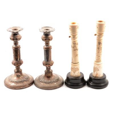 Lot 143 - Pair of Japanese bone candlesticks; and a pair of silver plated candlesticks