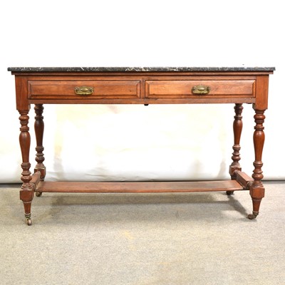 Lot 399 - Late Victorian walnut washstand, with a marble top