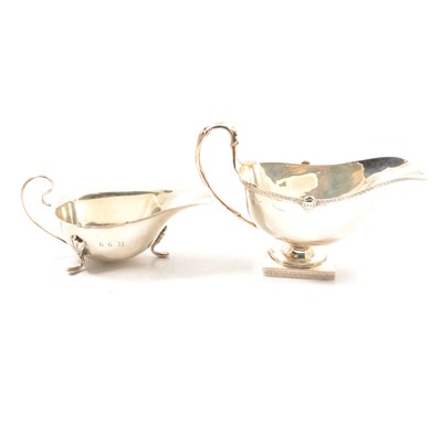 Lot 244 - Two silver sauce boats.