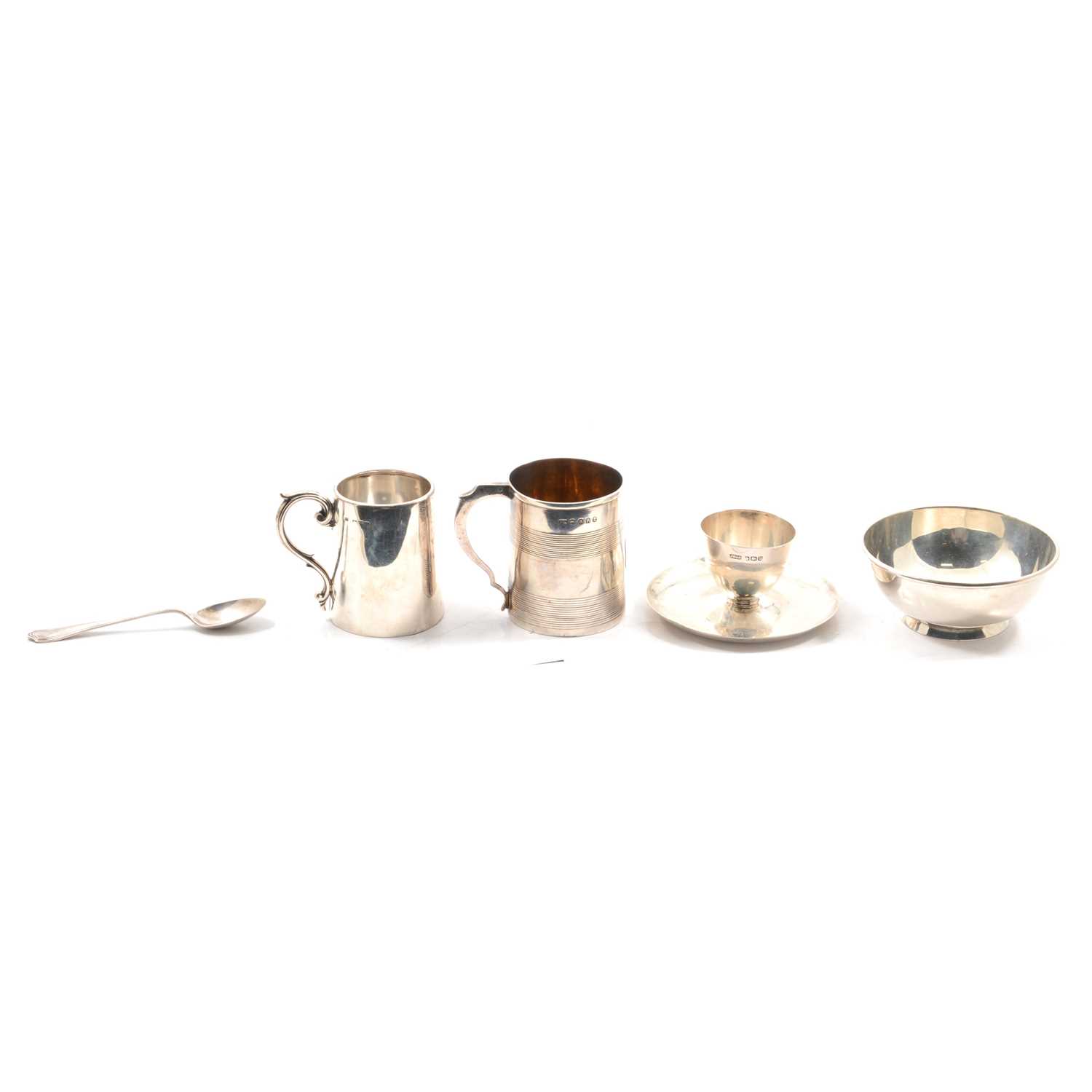 Lot 252 - Two silver christening mugs, small dish and eggcup and spoon.