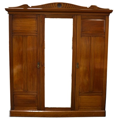 Lot 412 - Edwardian mahogany triple wardrobe