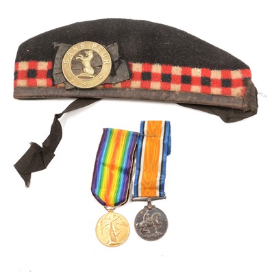 Lot 217 - Medals - a WW1 pair of medals, Seaforth Highlanders cap, and Honourable Discharge scroll.