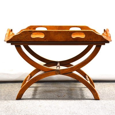 Lot 398 - A modern walnut veneer butlers tray top coffee table.