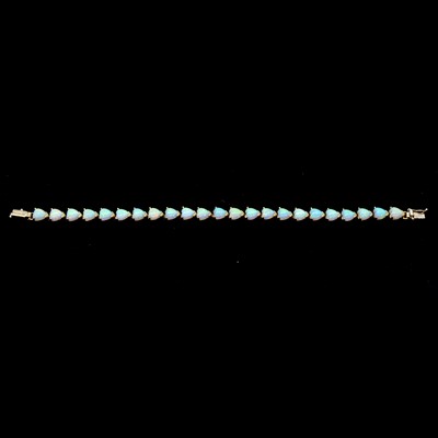 Lot 183 - A synthetic opal bracelet marked 585.