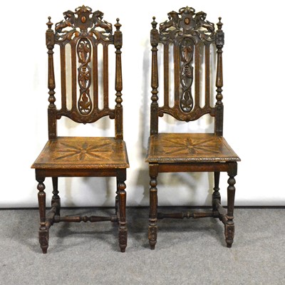 Lot 392 - Pair of carved oak hall chairs