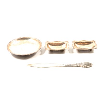 Lot 203 - Omar Ramsden silver letter knife, circular dish and a pair of salts