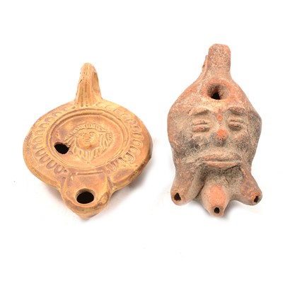 Lot 239 - Two Roman style pottery oil lamps