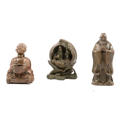 Lot 105 - Three Chinese patinated metal figures