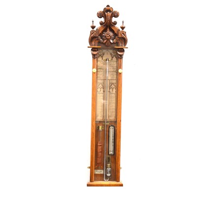 Lot 438 - An Admiral Fitzroy barometer supplied by John Dyson of Leeds in an oak case.