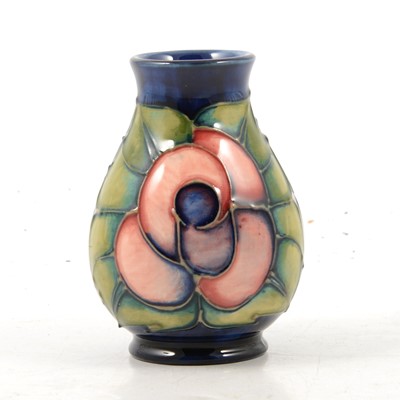 Lot 15 - Moorcroft Pottery, a 'Rose' design vase by Sally Tuffin, 1990