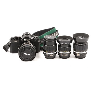 Lot 215 - Nikon FM2 35mm SLR film camera etc