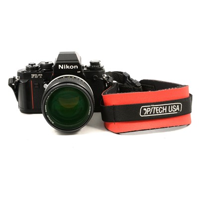 Lot 206 - Nikon F3/T 35mm SLR film camera, with Nikkor 85mm 1:1.4 lens.