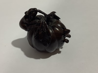 Lot 141 - Collection of eleven carved wooden netsukes and a tagua nut netsuke