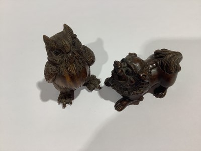 Lot 141 - Collection of eleven carved wooden netsukes and a tagua nut netsuke