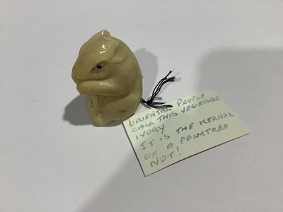 Lot 141 - Collection of eleven carved wooden netsukes and a tagua nut netsuke