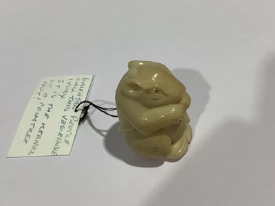 Lot 141 - Collection of eleven carved wooden netsukes and a tagua nut netsuke