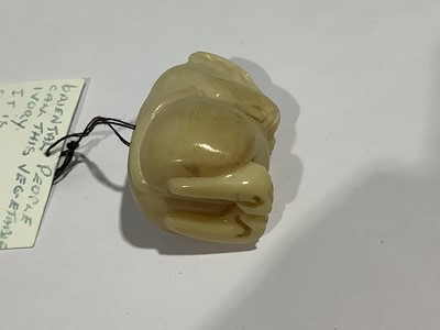 Lot 141 - Collection of eleven carved wooden netsukes and a tagua nut netsuke