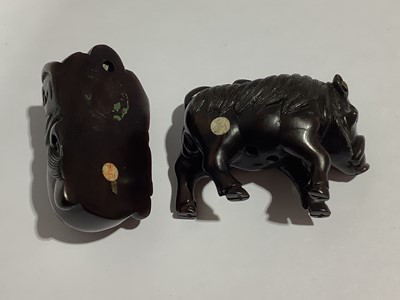 Lot 141 - Collection of eleven carved wooden netsukes and a tagua nut netsuke
