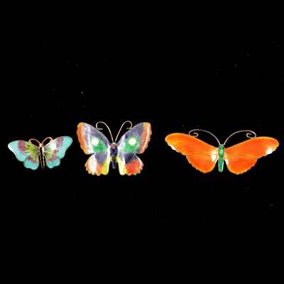 Lot 397 - Three enamel butterfly brooches.