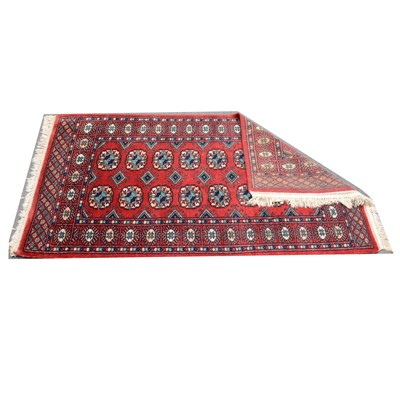 Lot 459 - A Pakistan wool pile rug and similar runner.