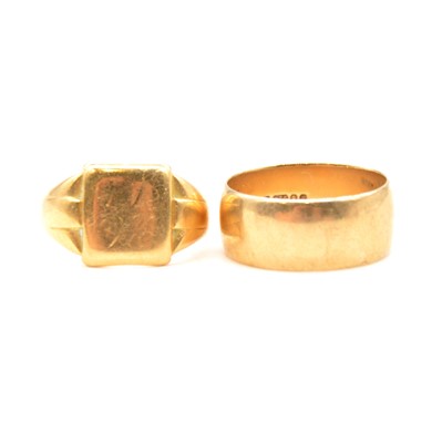 Lot 108 - A 9 carat yellow gold wedding band and 18 carat gold signet ring.