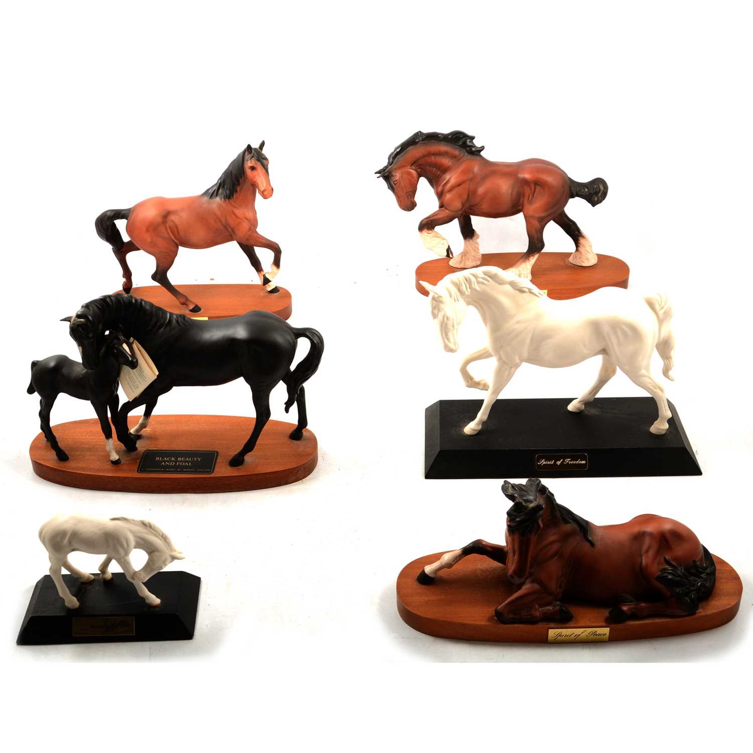 Lot 18 - Six Beswick horse models on wooden plinths.