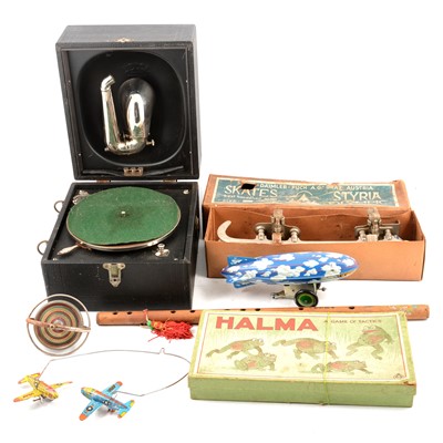 Lot 139 - A collection of vintage toys, vintage record player