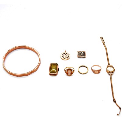 Lot 141 - A 9 carat gold slave bangle, watch, rings, pendant.