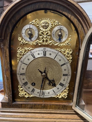 Lot 416 - Oak mantel clock