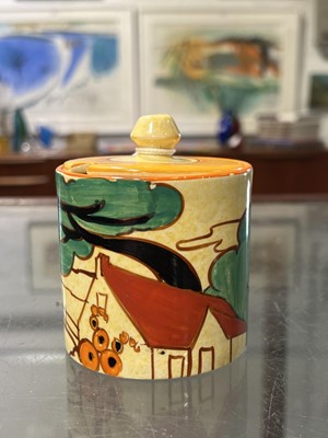 Lot 539 - Clarice Cliff, a 'Red Roofs' pattern preserve pot and cover