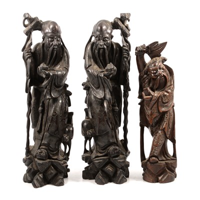 Lot 121 - Pair of Chinese carved hardwood figures and one other