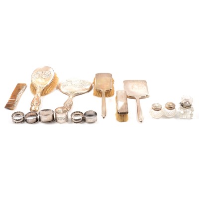 Lot 289 - Box of assorted silver including napkin rings, dressing table set, scent bottles