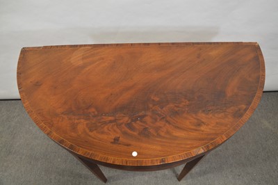 Lot 315 - George III mahogany demi lune card table