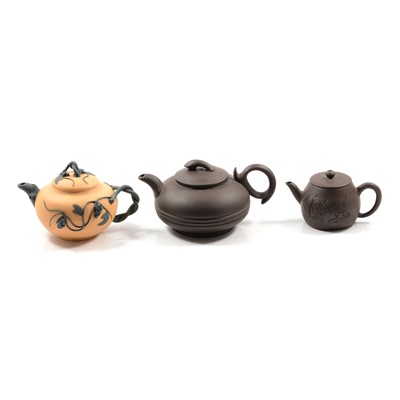 Lot 116 - Three Chinese redware teapots, and two porcelain teapots